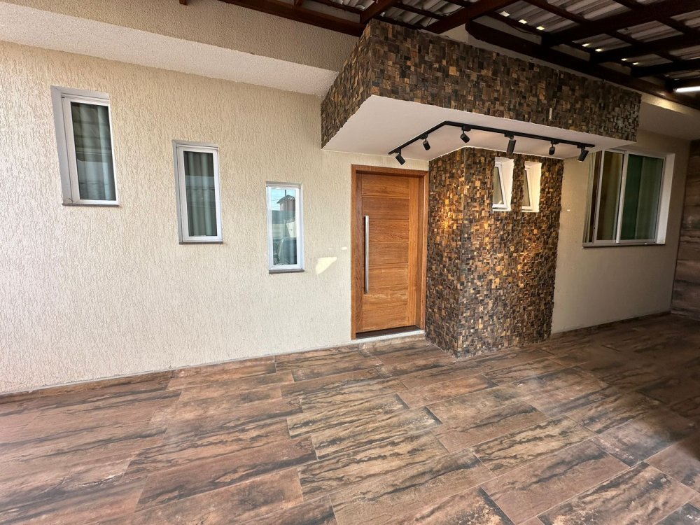 Casa à venda com 3 quartos, 100m² - Foto 1
